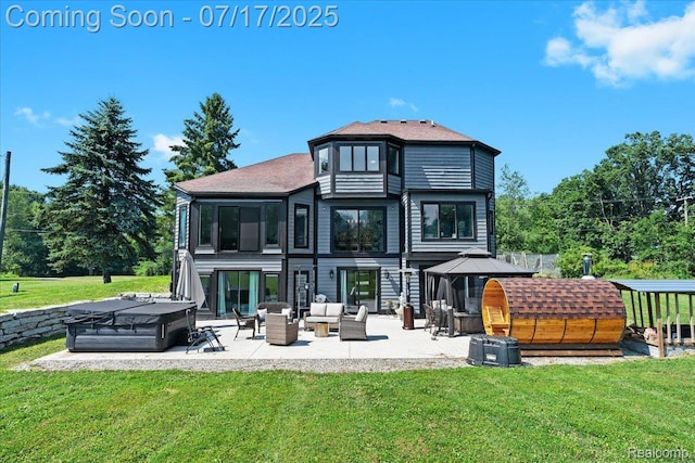 61353 W 8 Mile Rd, South Lyon, MI 48178 - back of house with a hot tub, a patio, a lawn, and outdoor lounge area