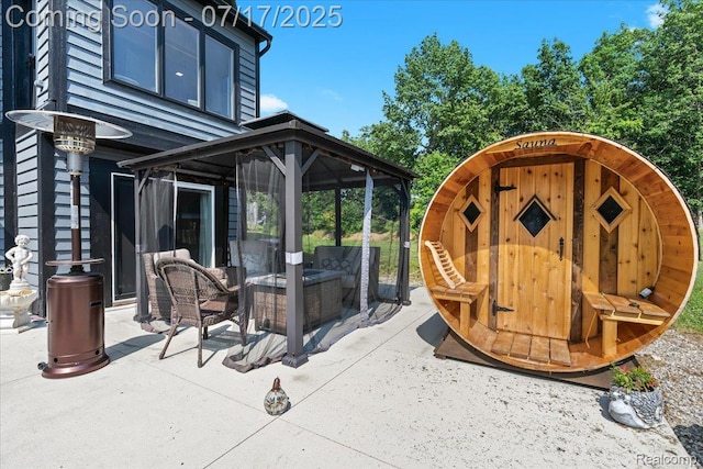 61353 W 8 Mile Rd, South Lyon, MI 48178 - view of patio / terrace featuring a gazebo and an outdoor living space