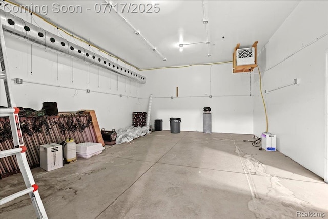 61353 W 8 Mile Rd, South Lyon, MI 48178 - garage featuring a heating unit