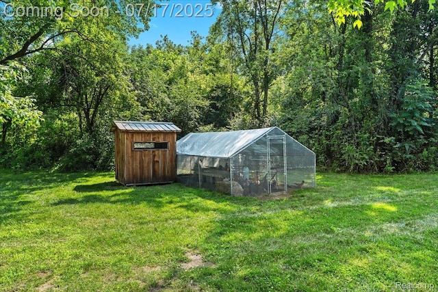 61353 W 8 Mile Rd, South Lyon, MI 48178 - view of outbuilding with a forest view