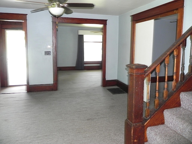 1111 S Main St, Three Rivers, MI 49093 - hallway featuring stairway and carpet flooring