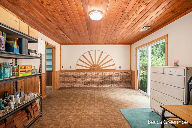 14180 168th Ave, Grand Haven, MI 49417 - miscellaneous room featuring wainscoting, wooden ceiling, and brick wall