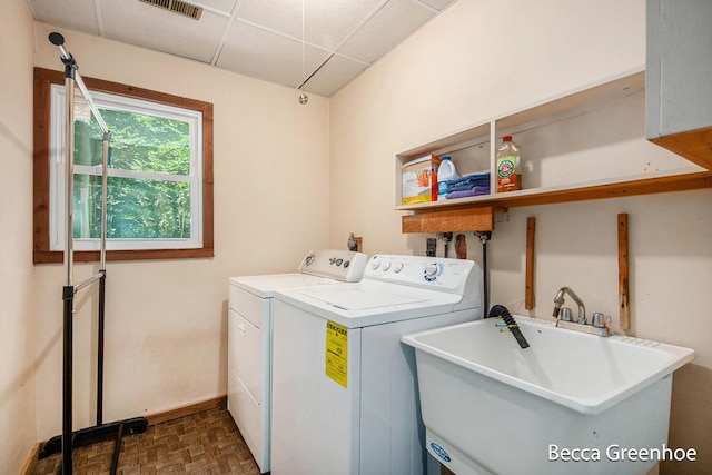 14180 168th Ave, Grand Haven, MI 49417 - laundry room featuring washer and dryer and baseboards