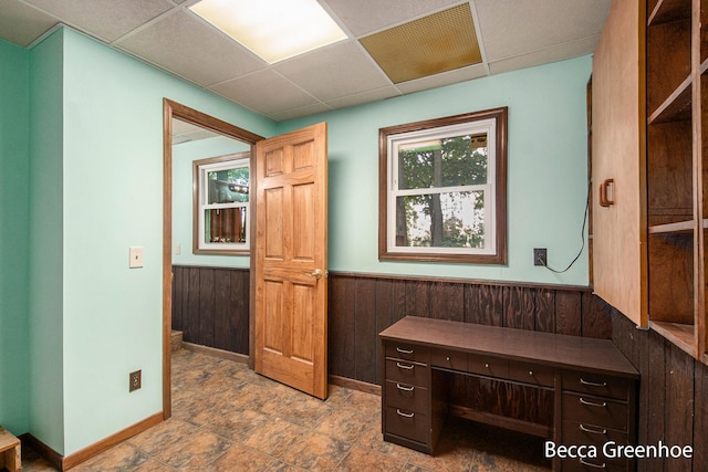 14180 168th Ave, Grand Haven, MI 49417 - office space with wainscoting, a drop ceiling, and wooden walls