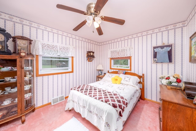 3110 13 Mile Rd, Remus, MI 49340 - carpeted bedroom featuring wallpapered walls and ceiling fan