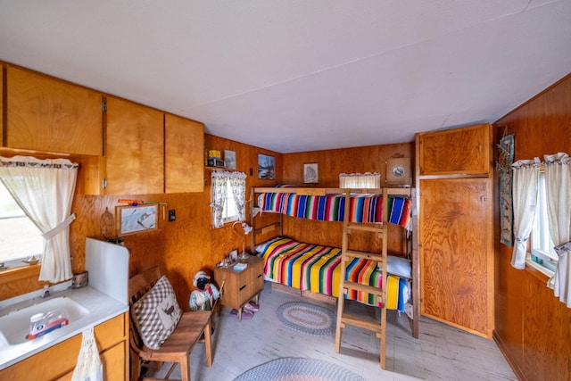 3110 13 Mile Rd, Remus, MI 49340 - bedroom featuring wood walls