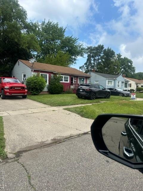 2118 Santa Barbara Dr, Flint, MI 48504 - single story home with a front lawn and driveway