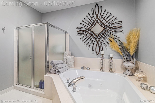 23331 Sawgrass Ct S, South Lyon, MI 48178 - bathroom featuring a shower stall, a whirlpool tub, and tile patterned flooring