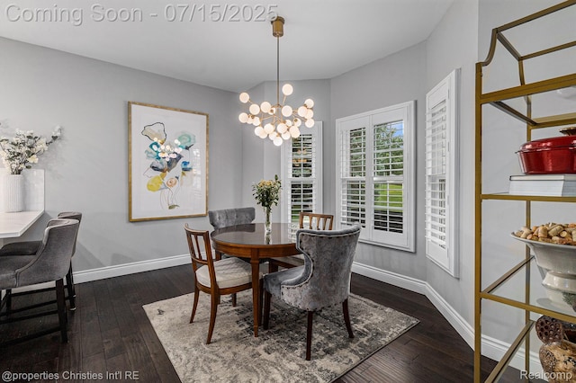 23331 Sawgrass Ct S, South Lyon, MI 48178 - dining space with dark wood-type flooring and a chandelier