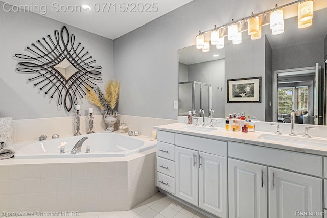 23331 Sawgrass Ct S, South Lyon, MI 48178 - bathroom with double vanity, a shower stall, a bath, and tile patterned floors