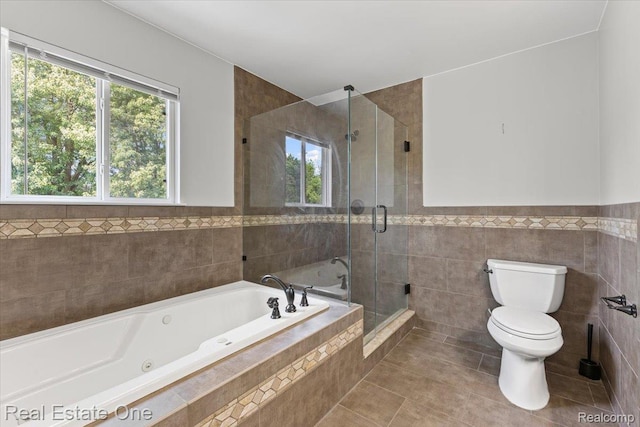 415 Evaline Dr, Troy, MI 48085 - full bath with tile walls, a jetted tub, tile patterned floors, a shower stall, and wainscoting