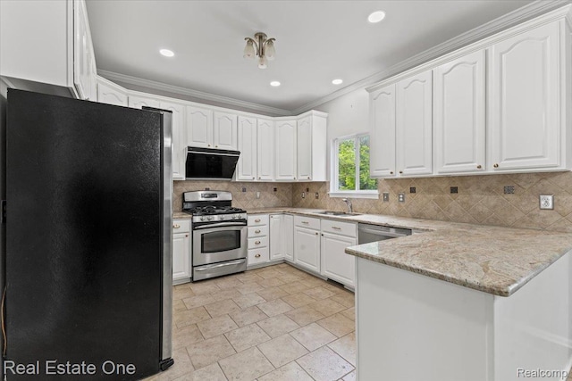 415 Evaline Dr, Troy, MI 48085 - kitchen featuring stainless steel appliances, a peninsula, white cabinets, backsplash, and crown molding