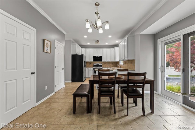 415 Evaline Dr, Troy, MI 48085 - dining area featuring ornamental molding, recessed lighting, and a chandelier