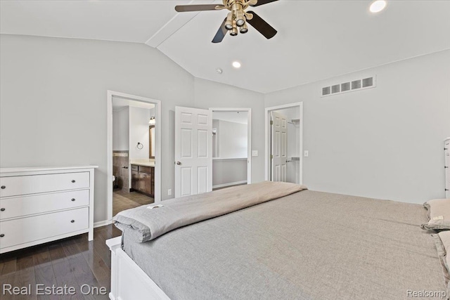 415 Evaline Dr, Troy, MI 48085 - bedroom with dark wood finished floors, vaulted ceiling, recessed lighting, ensuite bath, and ceiling fan