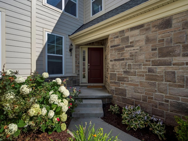 3064 N Spurway Dr, Ann Arbor, MI 48105 - view of exterior entry featuring a shingled roof