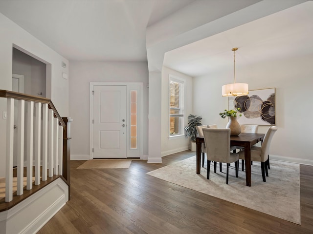 3064 N Spurway Dr, Ann Arbor, MI 48105 - foyer entrance featuring dark wood finished floors, stairs, and a chandelier