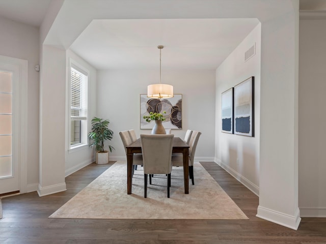 3064 N Spurway Dr, Ann Arbor, MI 48105 - dining area with dark wood-style floors and baseboards