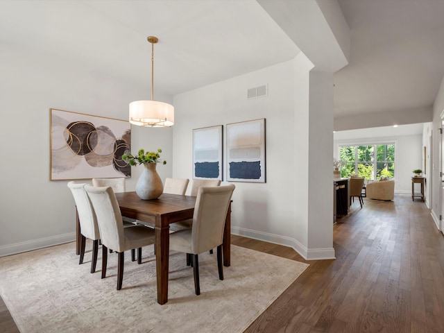 3064 N Spurway Dr, Ann Arbor, MI 48105 - dining space with baseboards and wood finished floors