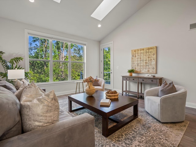 3064 N Spurway Dr, Ann Arbor, MI 48105 - living area featuring a skylight, recessed lighting, wood finished floors, and high vaulted ceiling