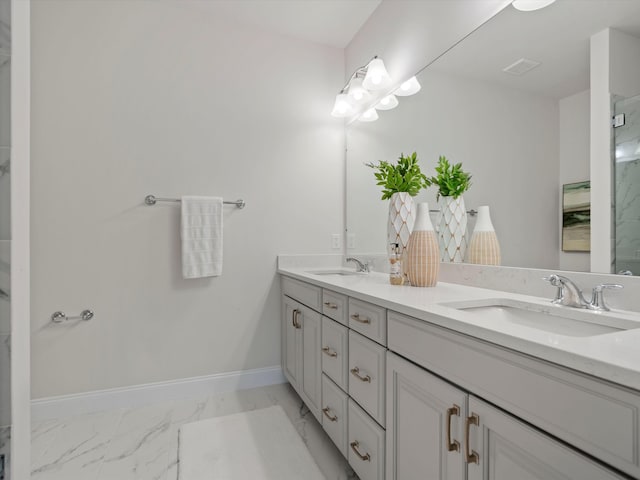 3064 N Spurway Dr, Ann Arbor, MI 48105 - bathroom with double vanity, marble finish flooring, and a shower