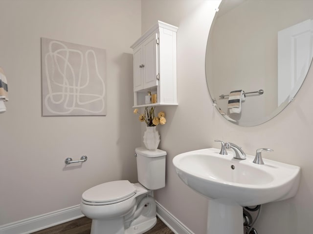 3064 N Spurway Dr, Ann Arbor, MI 48105 - bathroom with toilet and wood finished floors