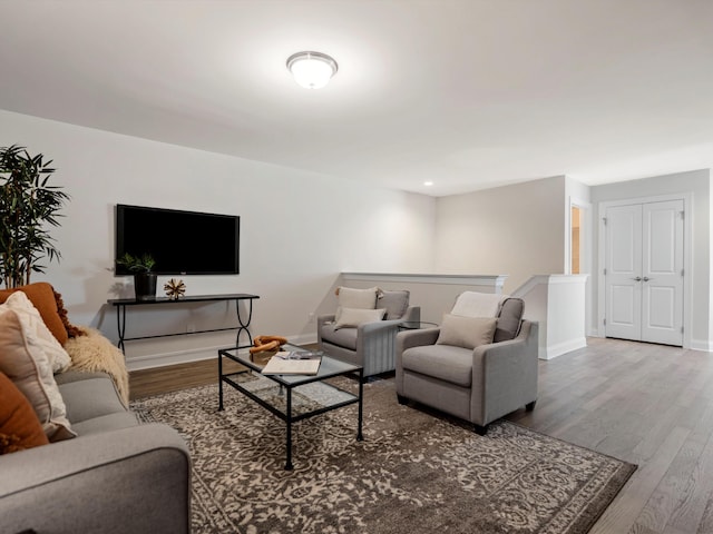 3064 N Spurway Dr, Ann Arbor, MI 48105 - living area featuring wood finished floors and baseboards