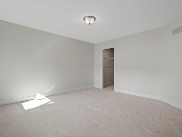 3064 N Spurway Dr, Ann Arbor, MI 48105 - unfurnished room featuring light carpet and baseboards