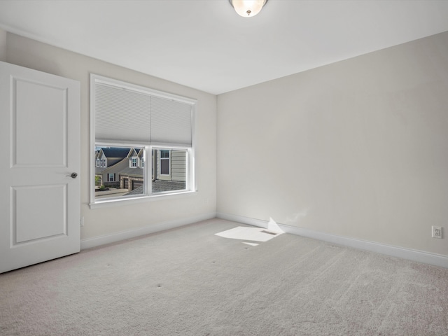 3064 N Spurway Dr, Ann Arbor, MI 48105 - carpeted spare room featuring baseboards
