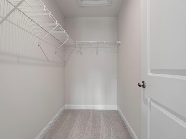3064 N Spurway Dr, Ann Arbor, MI 48105 - walk in closet featuring carpet