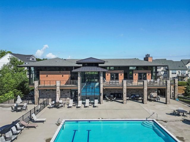 3064 N Spurway Dr, Ann Arbor, MI 48105 - community pool featuring a patio
