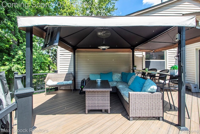 761 Stoney Dr, South Lyon, MI 48178 - wooden deck with a gazebo and an outdoor hangout area