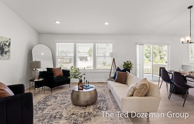 3171 Timberpine Ave, Holland, MI 49424 - living room with a chandelier, wood finished floors, and recessed lighting