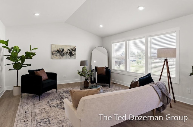 3171 Timberpine Ave, Holland, MI 49424 - living room with wood finished floors, vaulted ceiling, and recessed lighting