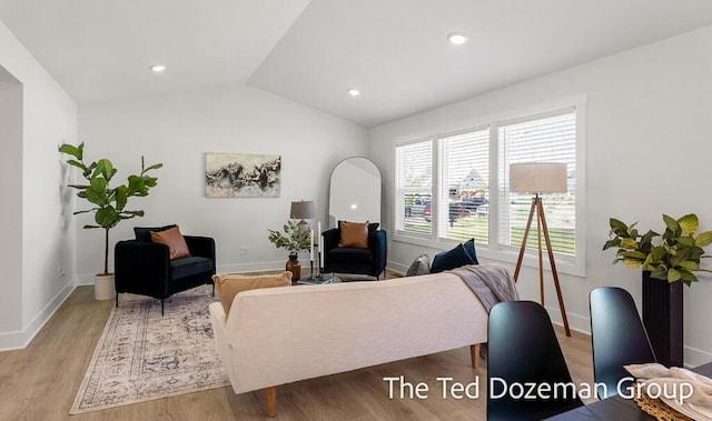 3171 Timberpine Ave, Holland, MI 49424 - living room featuring wood finished floors and lofted ceiling