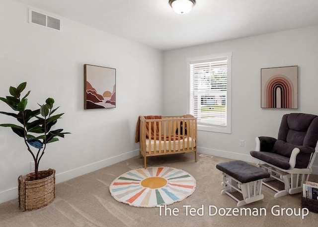 3171 Timberpine Ave, Holland, MI 49424 - carpeted bedroom with baseboards and a nursery area