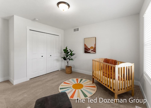 3171 Timberpine Ave, Holland, MI 49424 - carpeted bedroom with multiple windows, a closet, and a crib
