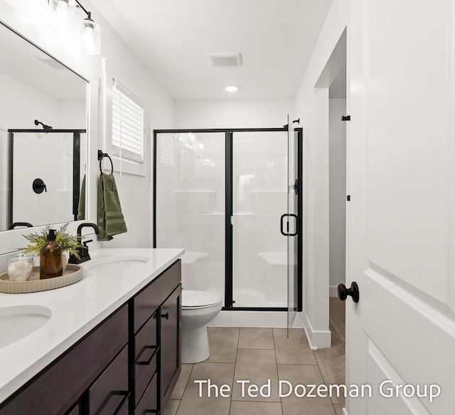 3171 Timberpine Ave, Holland, MI 49424 - bathroom featuring a shower stall, double vanity, and tile patterned floors
