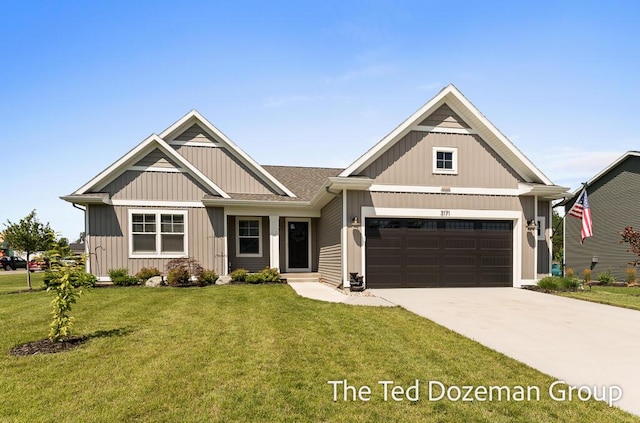 3171 Timberpine Ave, Holland, MI 49424 - craftsman-style house featuring concrete driveway, a front lawn, board and batten siding, and a garage