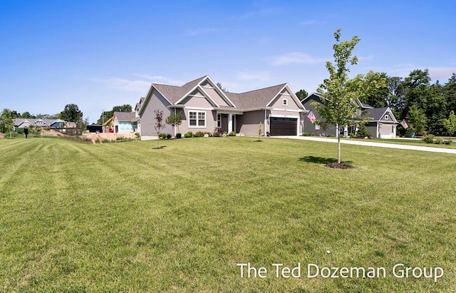 3171 Timberpine Ave, Holland, MI 49424 - craftsman-style house with an attached garage, concrete driveway, and a front yard