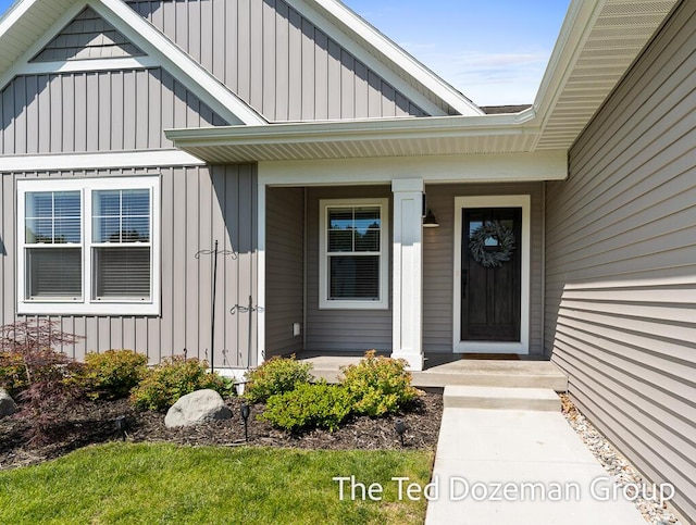 3171 Timberpine Ave, Holland, MI 49424 - view of exterior entry with board and batten siding