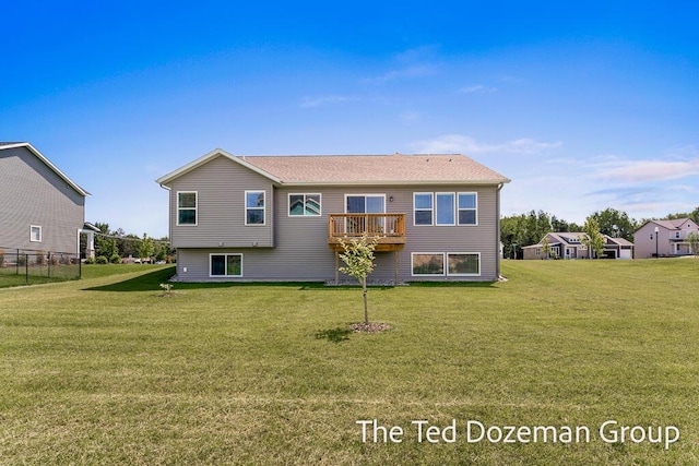 3171 Timberpine Ave, Holland, MI 49424 - back of property with a yard and a deck