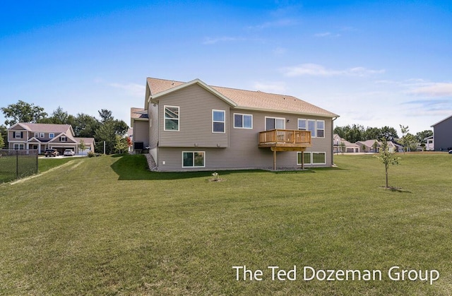 3171 Timberpine Ave, Holland, MI 49424 - back of house with a yard and a deck