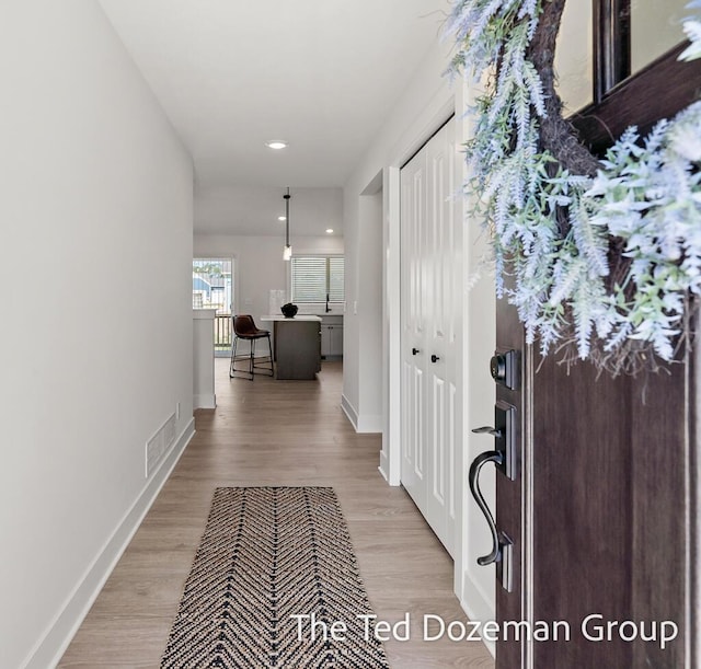 3171 Timberpine Ave, Holland, MI 49424 - foyer entrance with light wood finished floors and recessed lighting