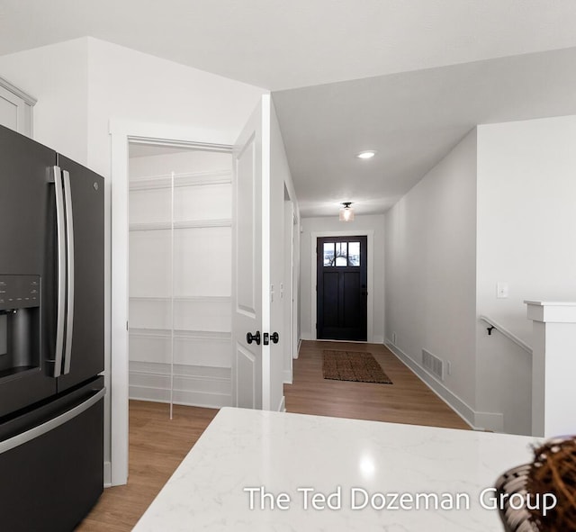 3171 Timberpine Ave, Holland, MI 49424 - entrance foyer featuring light wood-style flooring and recessed lighting