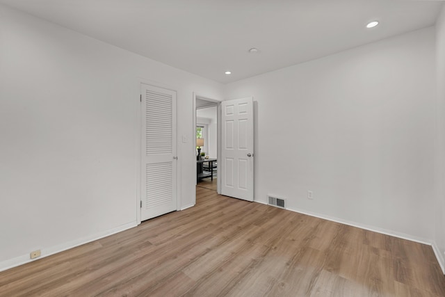 1618 Birmingham Blvd, Birmingham, MI 48009 - unfurnished bedroom featuring light wood-style floors and recessed lighting
