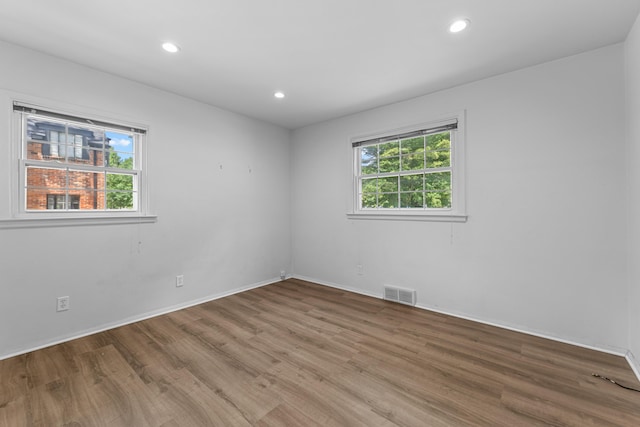 1618 Birmingham Blvd, Birmingham, MI 48009 - spare room with wood finished floors and recessed lighting