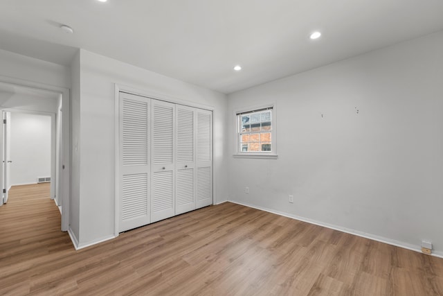 1618 Birmingham Blvd, Birmingham, MI 48009 - unfurnished bedroom featuring light wood-type flooring, recessed lighting, and a closet