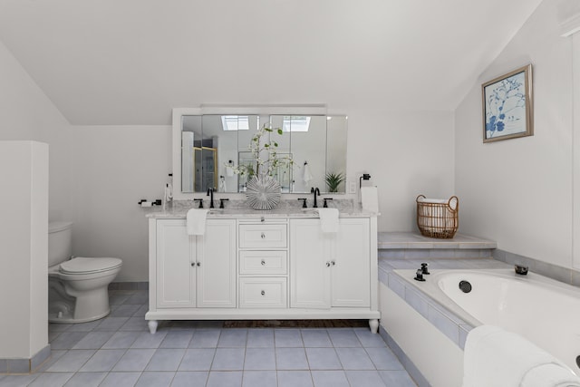 1618 Birmingham Blvd, Birmingham, MI 48009 - bathroom featuring lofted ceiling, a garden tub, double vanity, tile patterned floors, and a shower stall