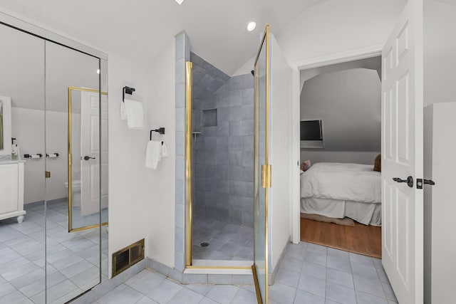 1618 Birmingham Blvd, Birmingham, MI 48009 - bathroom featuring a shower stall, tile patterned flooring, ensuite bath, and vaulted ceiling