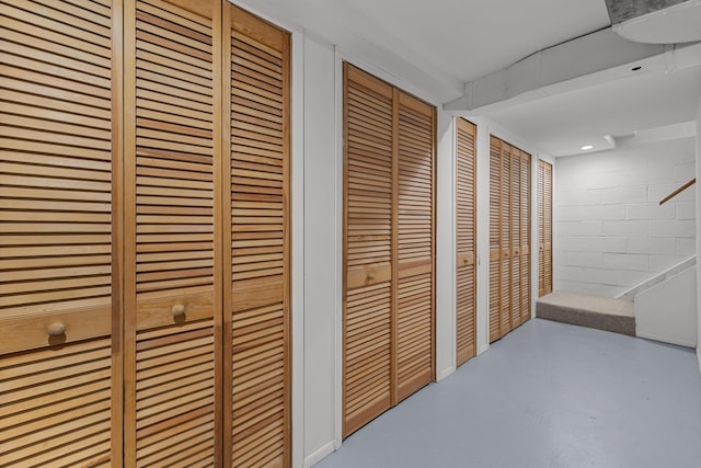 1618 Birmingham Blvd, Birmingham, MI 48009 - corridor featuring concrete floors and concrete block wall